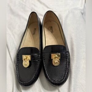 Michael Kors Black Patient Leather Loafers with Gold Details
